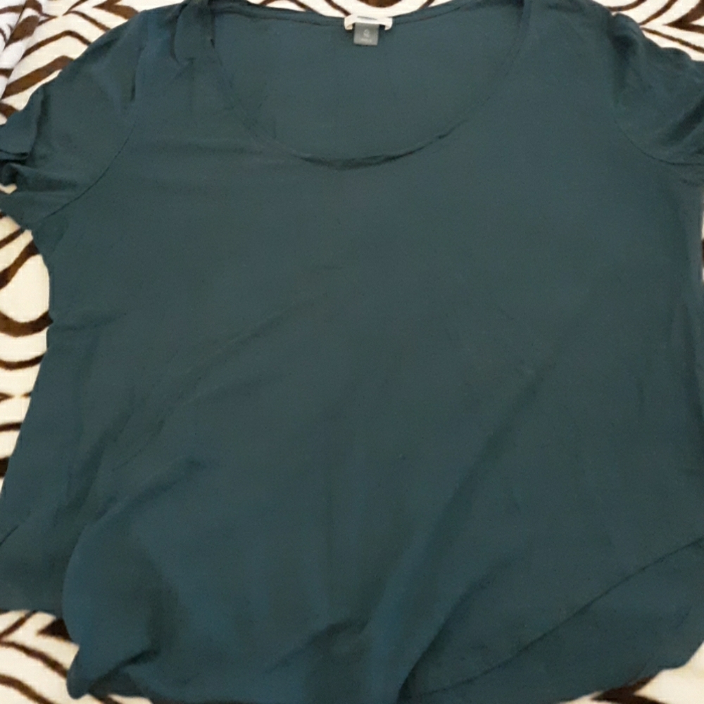 Turquoise or teal shirt